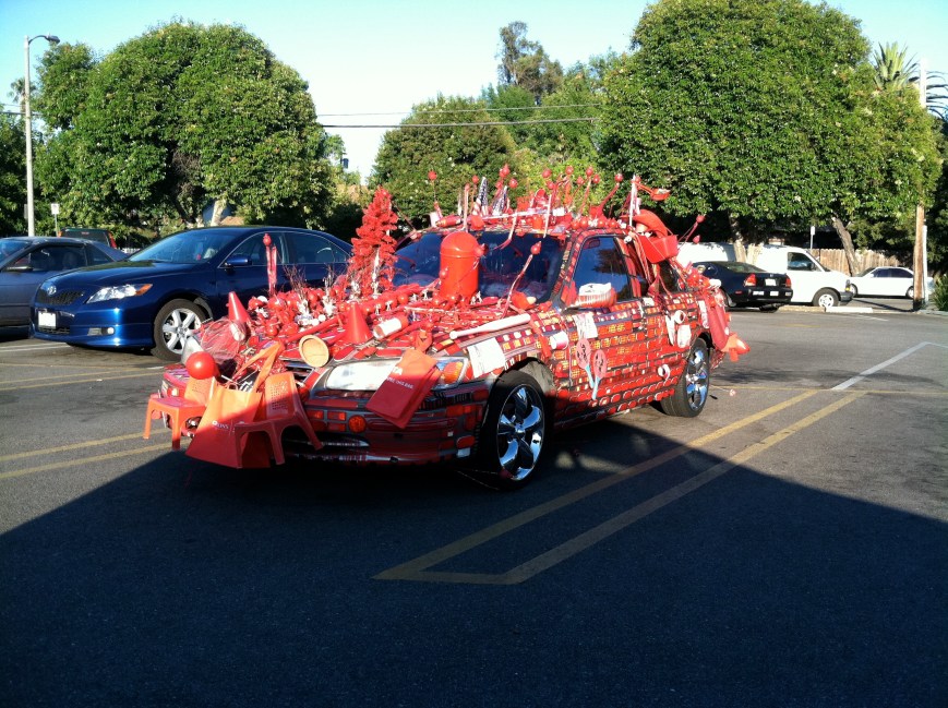 The everything red car ...